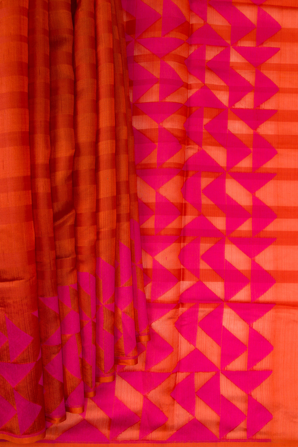 Pleats and pallu of Orange Tussar Saree with Stripes on the body and Fancy Border. 