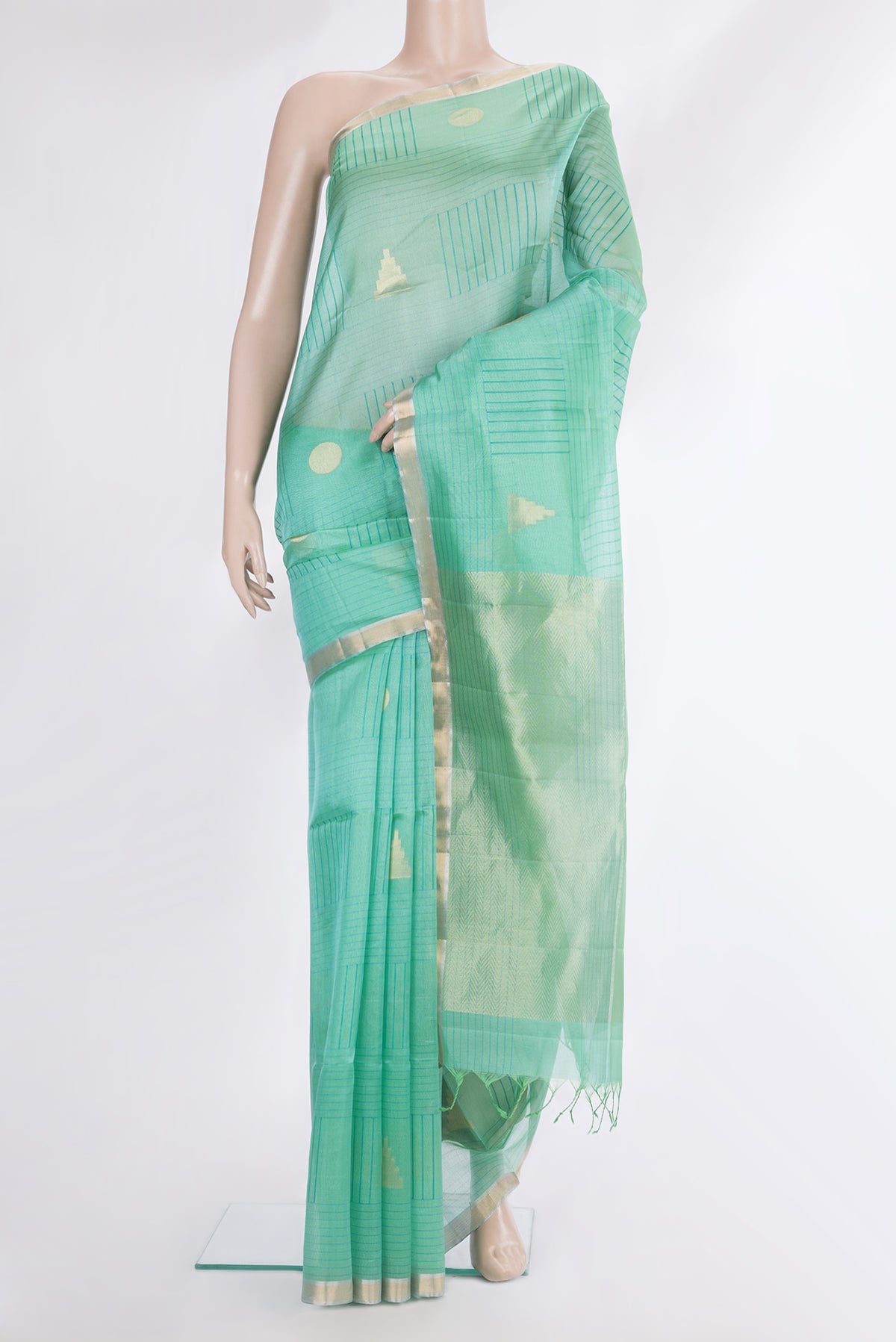Pure Silk Sea Green Dual Tone Tussar Saree with Stripes on the body and Zari Border.  displayed on a mannequin