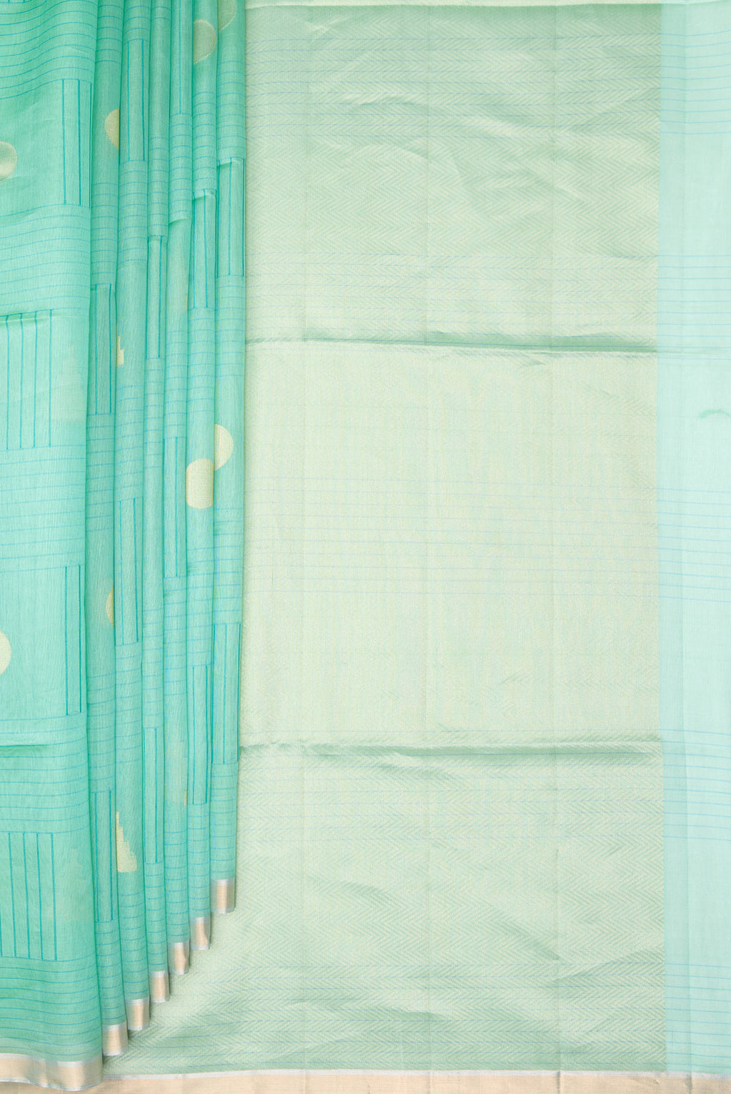 Pleats and pallu of Pure Silk Sea Green Dual Tone Tussar Saree with Stripes on the body and Zari Border. 