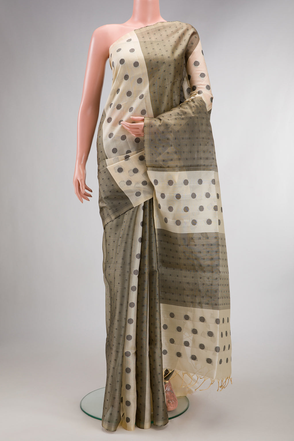 Pure Silk Multi Color Soft Saree with Thread Butta on the body and Without Border.  displayed on a mannequin