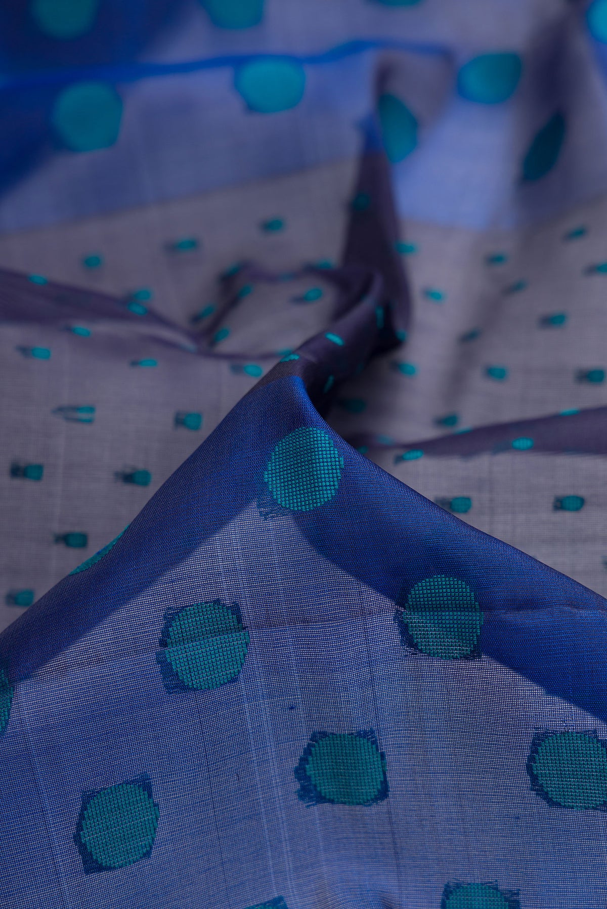 Close up of Pure Silk Multi Color Soft Saree with Thread Butta on the body and Without Border.  displaying folds