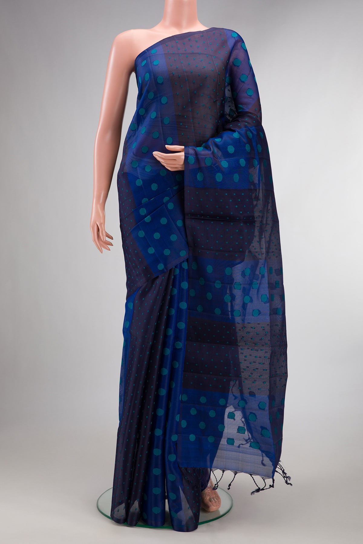 Pure Silk Multi Color Soft Saree with Thread Butta on the body and Without Border.  displayed on a mannequin