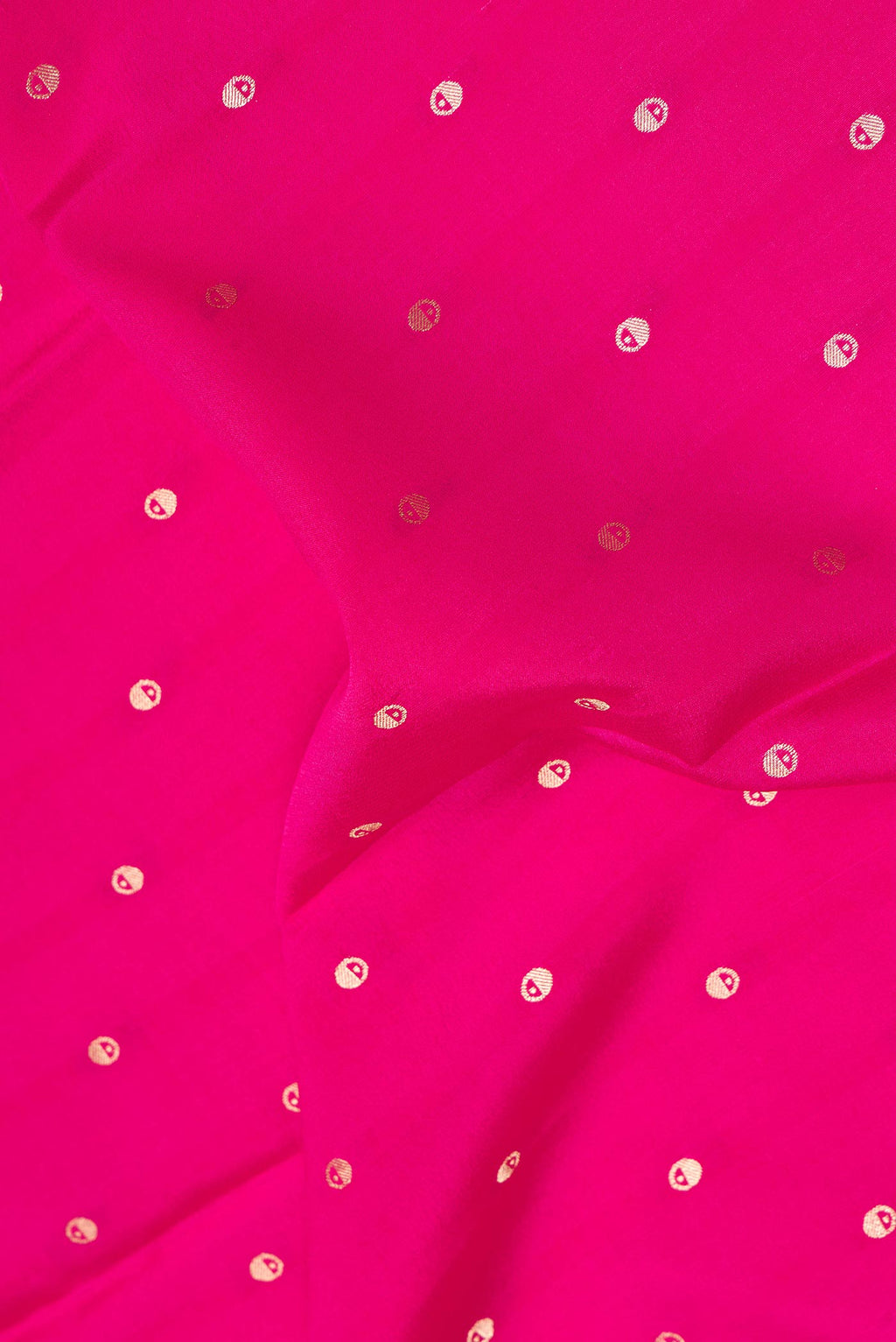 Close up of Pure Silk Dark Pink Dual Tone Mysore Silk Saree with Zari Butta on the body and Zari Border.  displaying folds