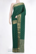 Pure Silk Bottle Green Dual Tone Mysore Silk Saree with Zari Butta on the body and Zari Border.  displayed on a mannequin