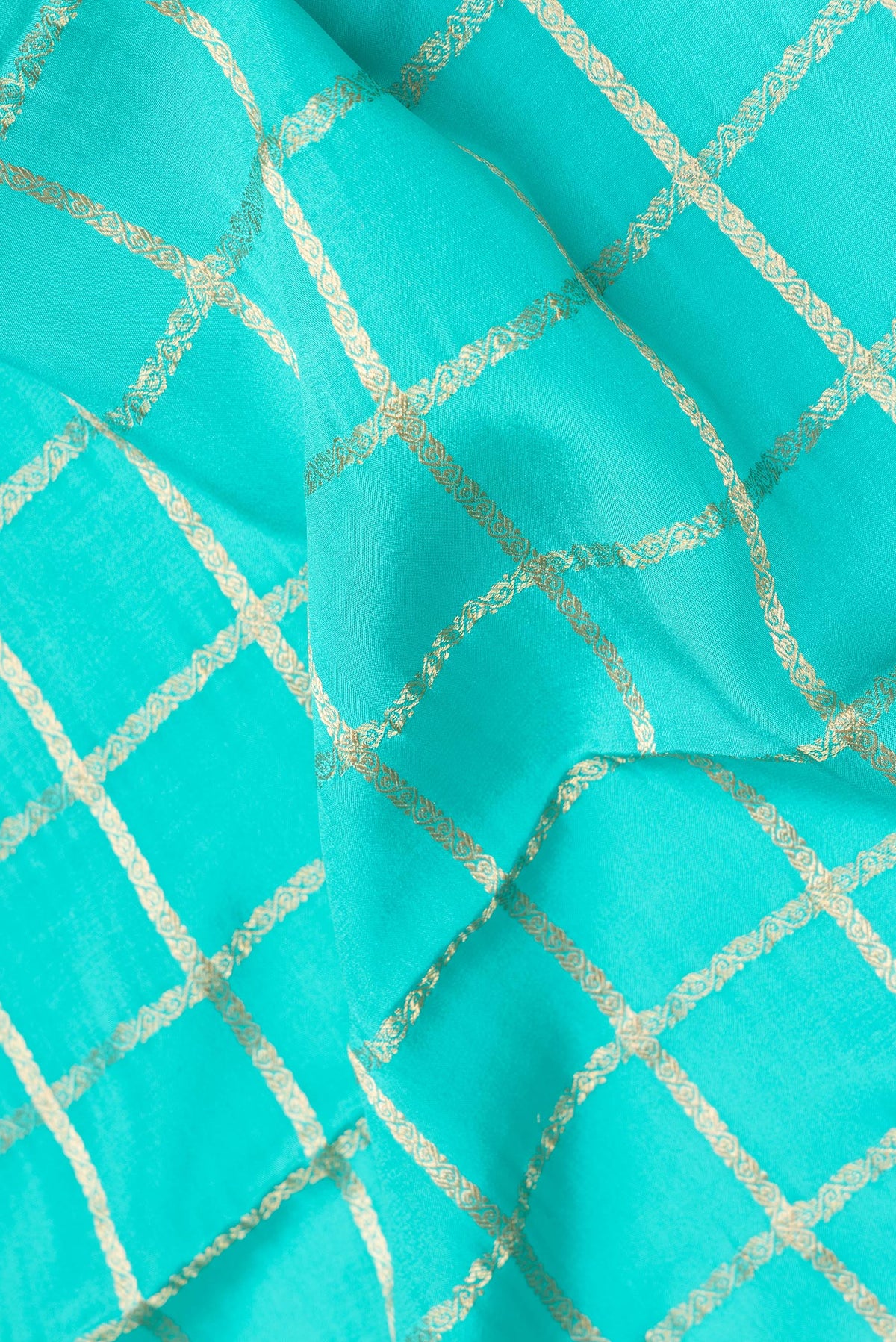 Close up of Pure Silk Sky Blue Dual Tone Mysore Silk Saree with Checked design on the body and Fancy Border.  displaying folds