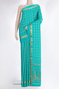 Pure Silk Sky Blue Dual Tone Mysore Silk Saree with Checked design on the body and Fancy Border.  displayed on a mannequin