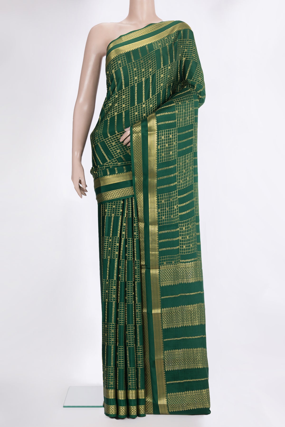 Bottle Green Mysore Crepe Saree with Checked design on the body and Zari Border.  displayed on a mannequin