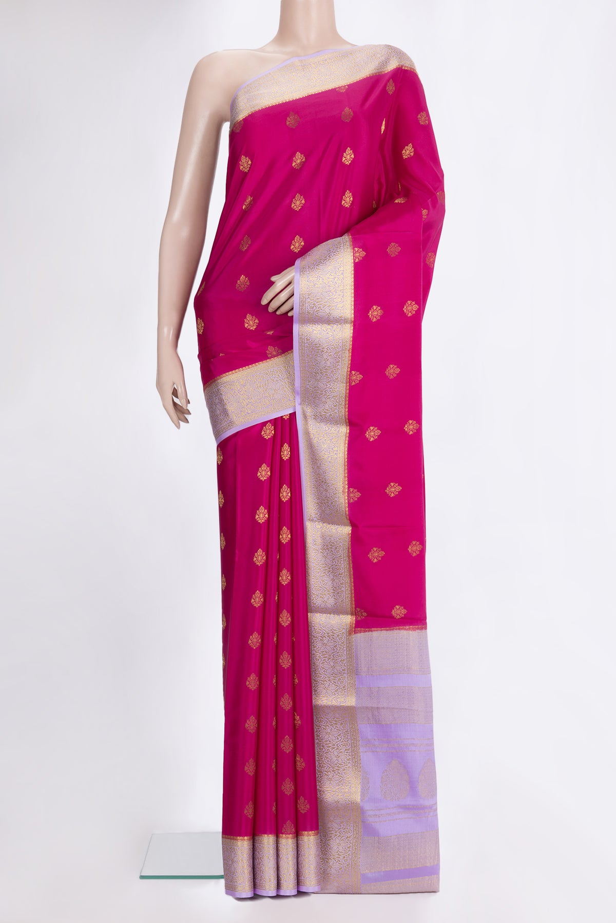 Dark Pink Mysore Crepe Saree with Zari Butta on the body and Zari Border.  displayed on a mannequin