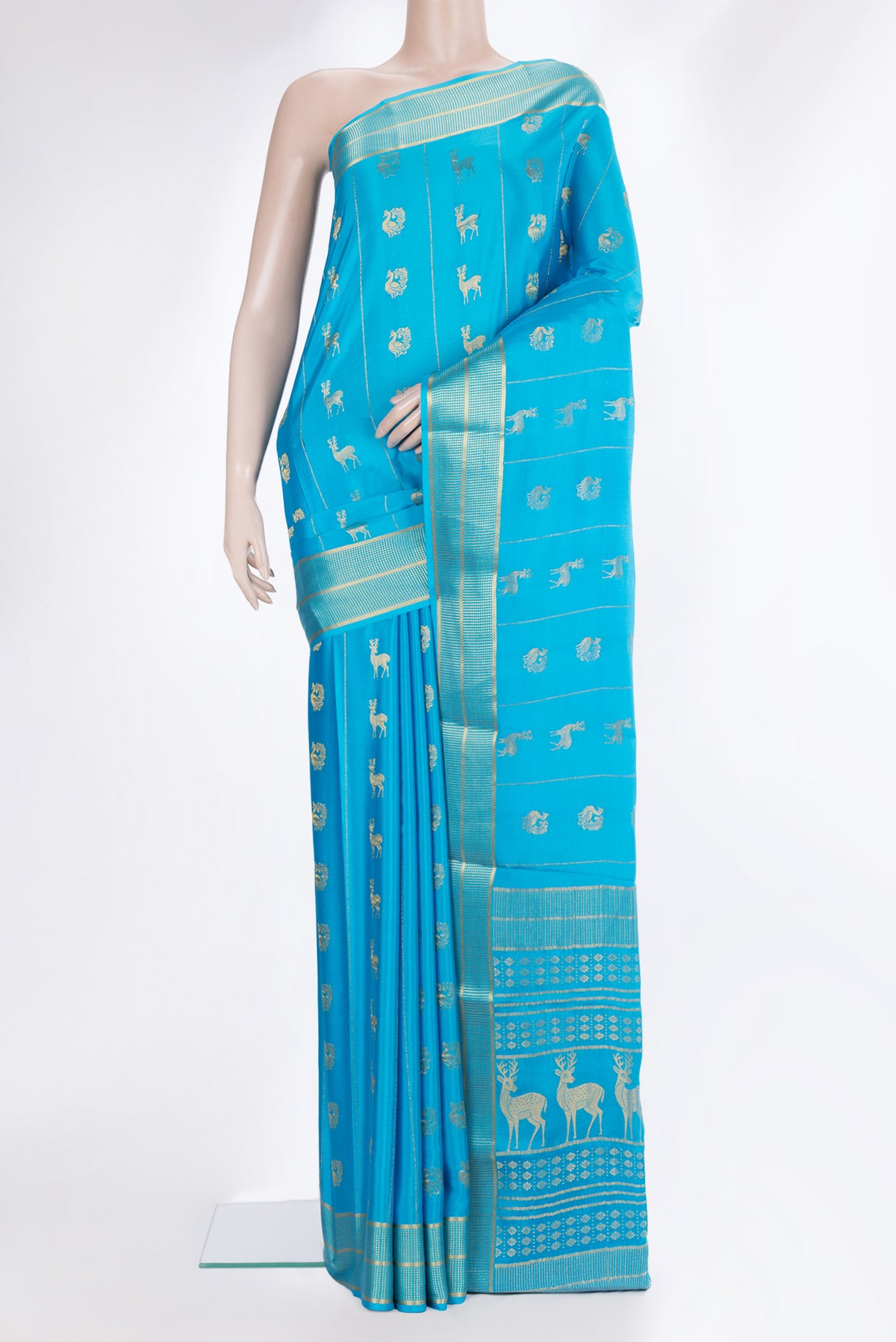 Pure Silk Sky Blue Dual Tone Mysore Silk Saree with Zari Butta on the body and Zari Border.  displayed on a mannequin