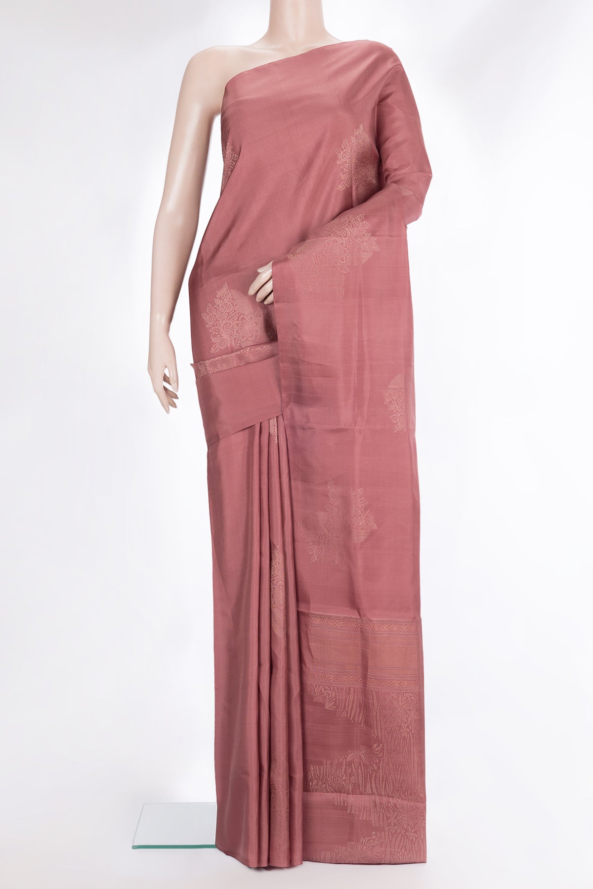 Pure Silk Rose Gold Dual Tone Soft Saree with Zari Butta on the body and Without Border.  displayed on a mannequin