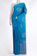 Pure Silk Peacock Blue Dual Tone Soft Saree with Zari Butta on the body and Without Border.  displayed on a mannequin
