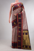 Pure Silk Pure Zari Mauve Kanjivaram Saree with Zari Brocade on the body and Fancy Border.  displayed on a mannequin