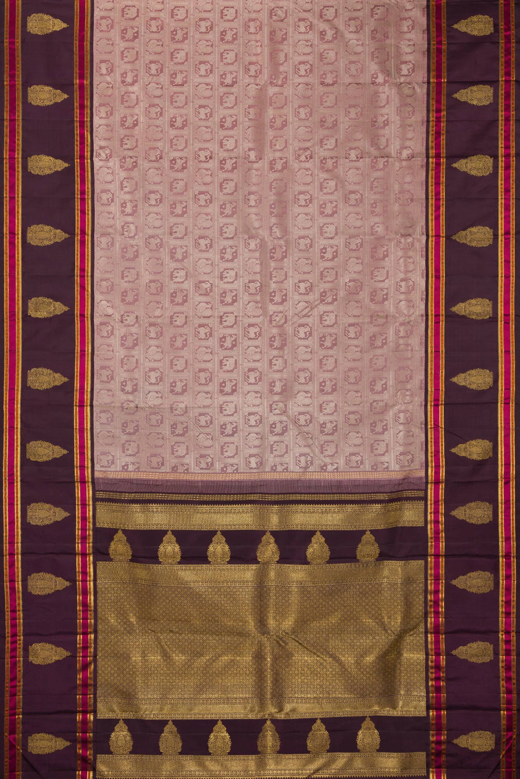 Flat view of Pure Silk Pure Zari Mauve Kanjivaram Saree with Zari Brocade on the body and Fancy Border. 