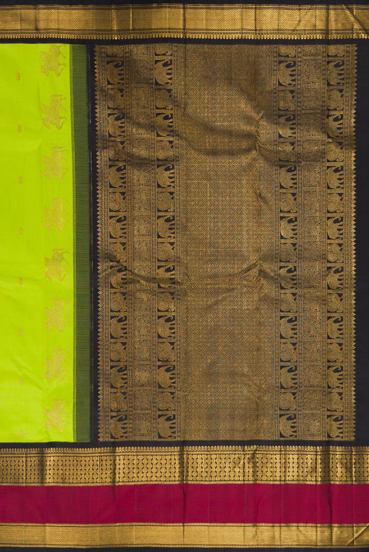 Close up image of the pallu of Pure Silk Parrot Green Kanchipuram Saree with Zari Butta on the body and Zari Border. 