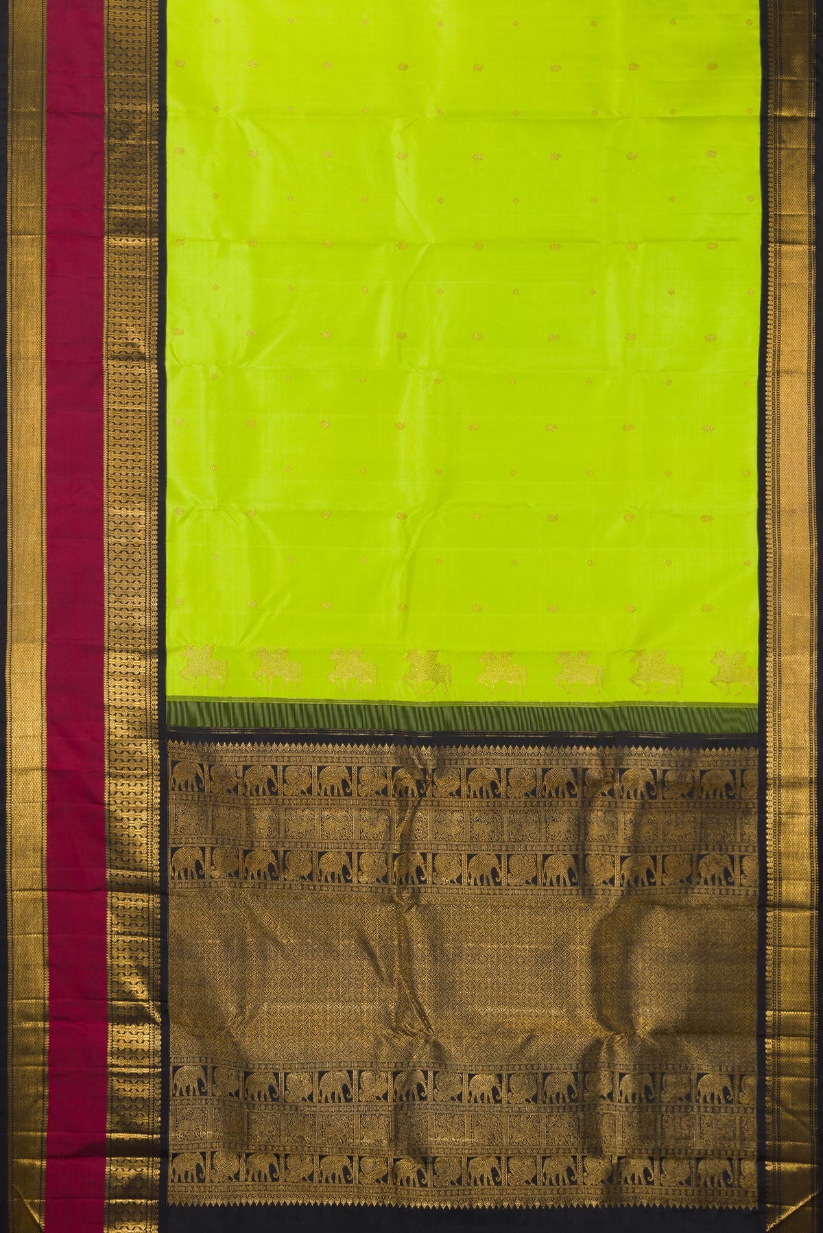 Flat view of Pure Silk Parrot Green Kanchipuram Saree with Zari Butta on the body and Zari Border. 