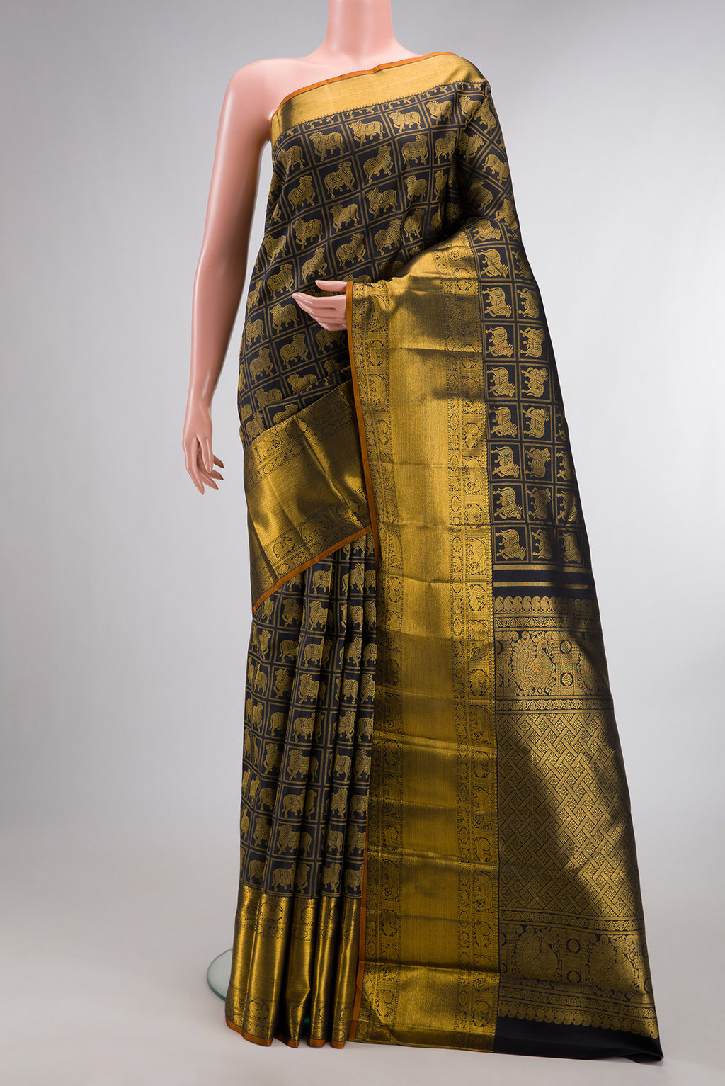 Pure Silk Black Dual Tone Kanchipuram Saree with Checked design on the body and Zari Border.  displayed on a mannequin