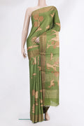 Mehandi Green Tussar Saree with Printed design on the body and Zari Border.  displayed on a mannequin