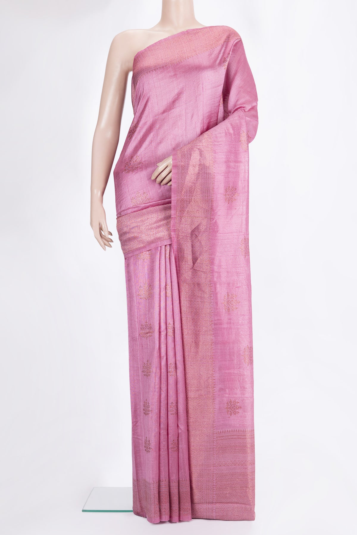 Rose pink Raw Saree with Zari Butta on the body and Zari Border.  displayed on a mannequin