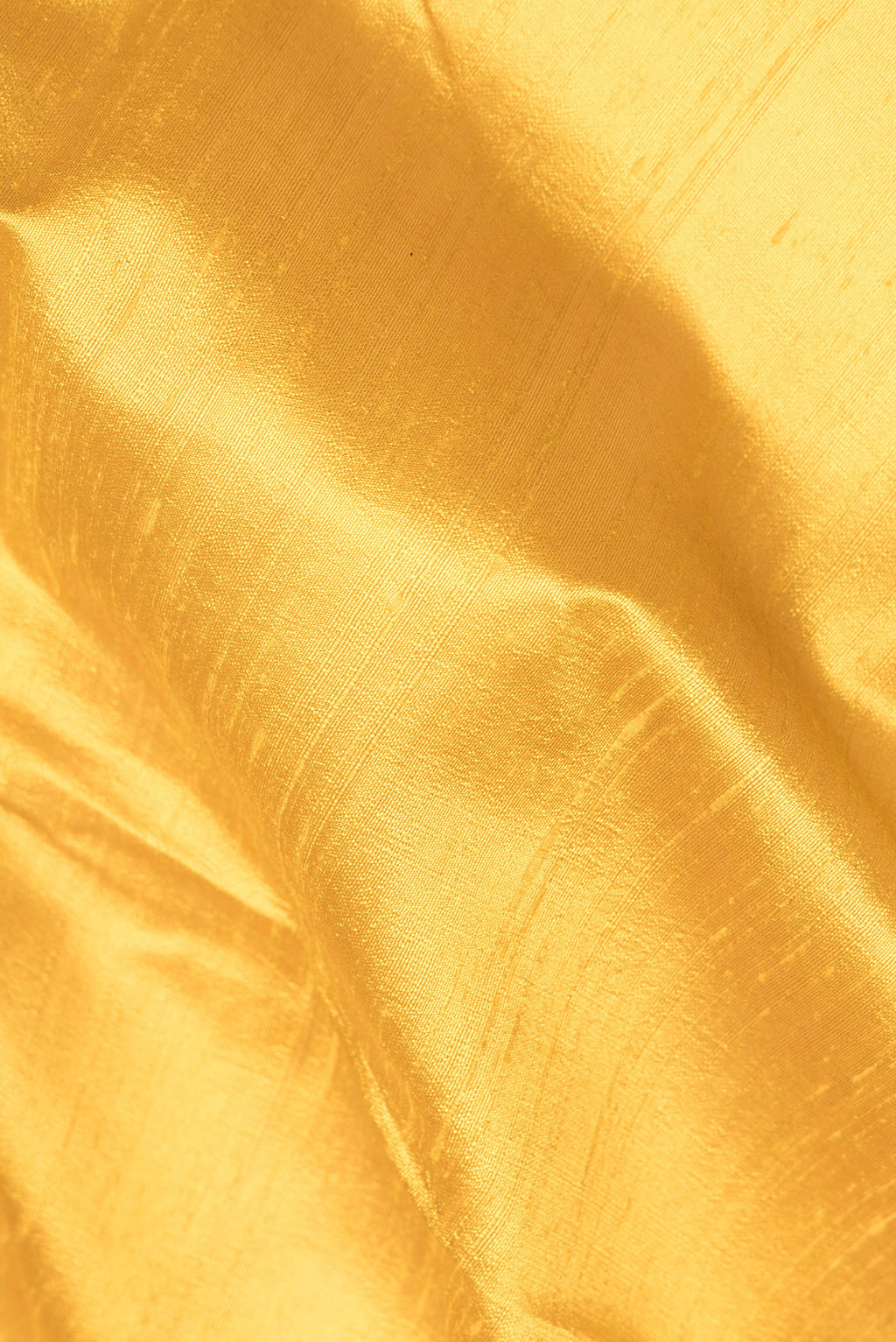 Close up of Yellow Raw Saree with Plain Body and Zari Border.  displaying folds