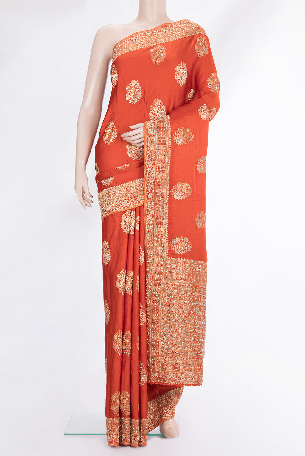 Orange Satin Saree with Embroidered on the body and Sequin Border.  displayed on a mannequin