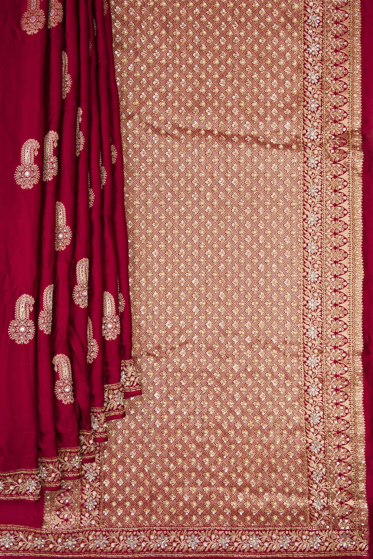 Pleats and pallu of Maroon Satin Crepe Saree with Embroidered on the body and Sequin Border. 