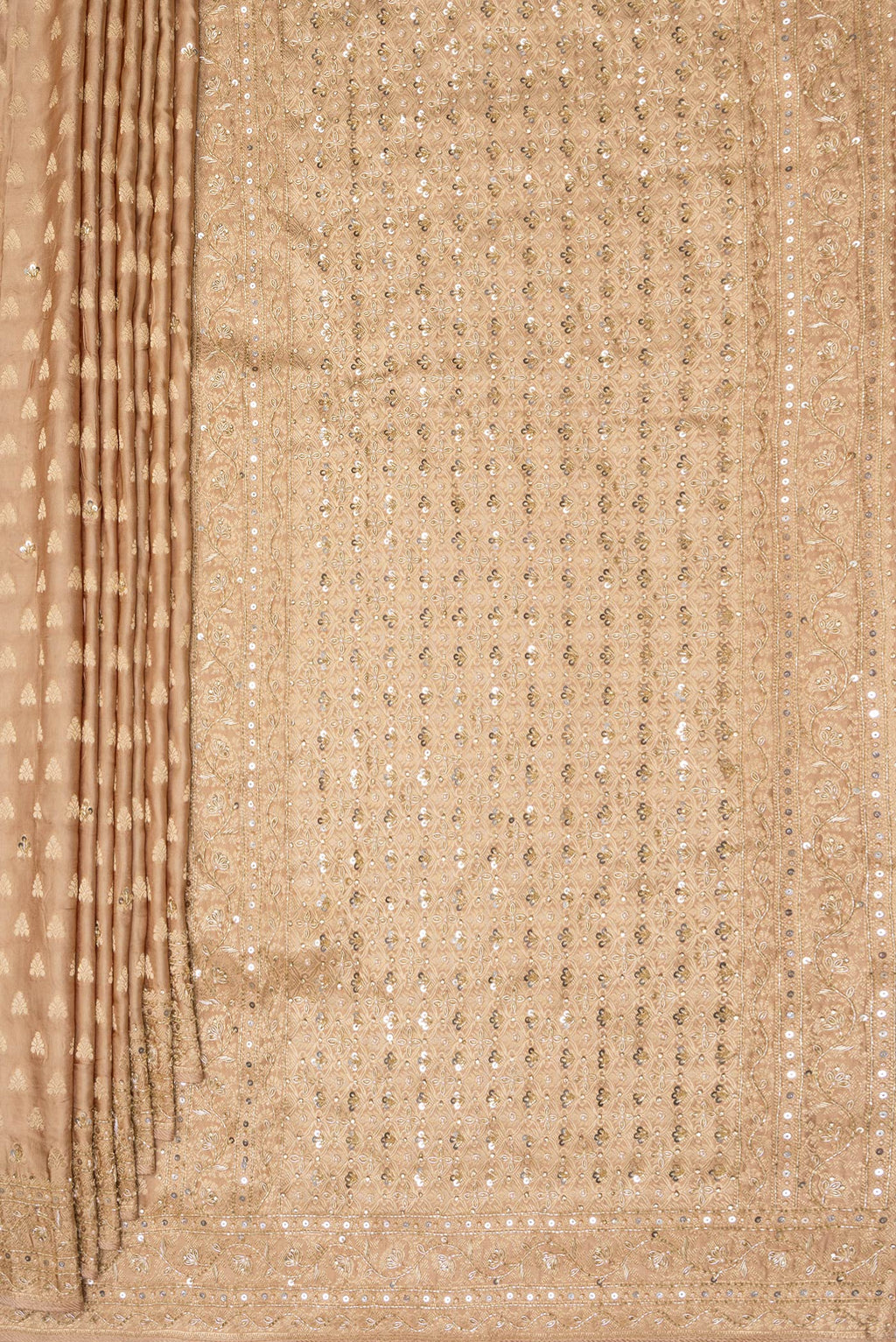 Pleats and pallu of Sandal Satin Saree with Embroidered on the body and Embroidered Border. 