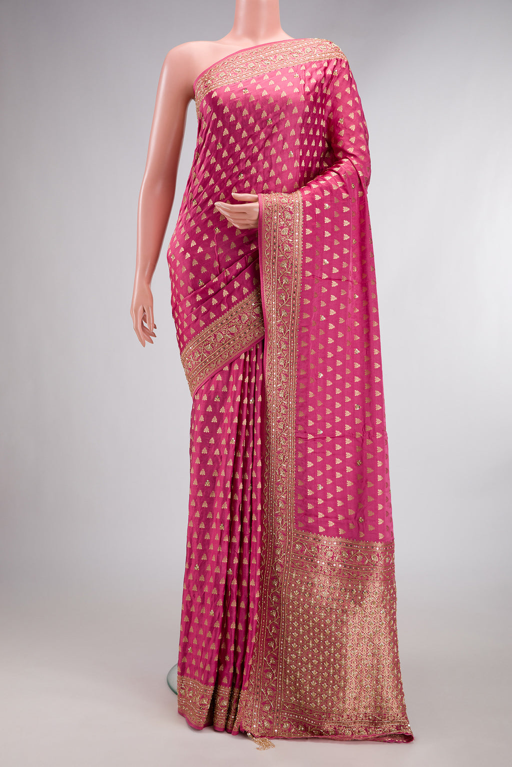 Pink Dual Tone Satin Crepe Saree with Embroidered on the body and Sequin Border.  displayed on a mannequin