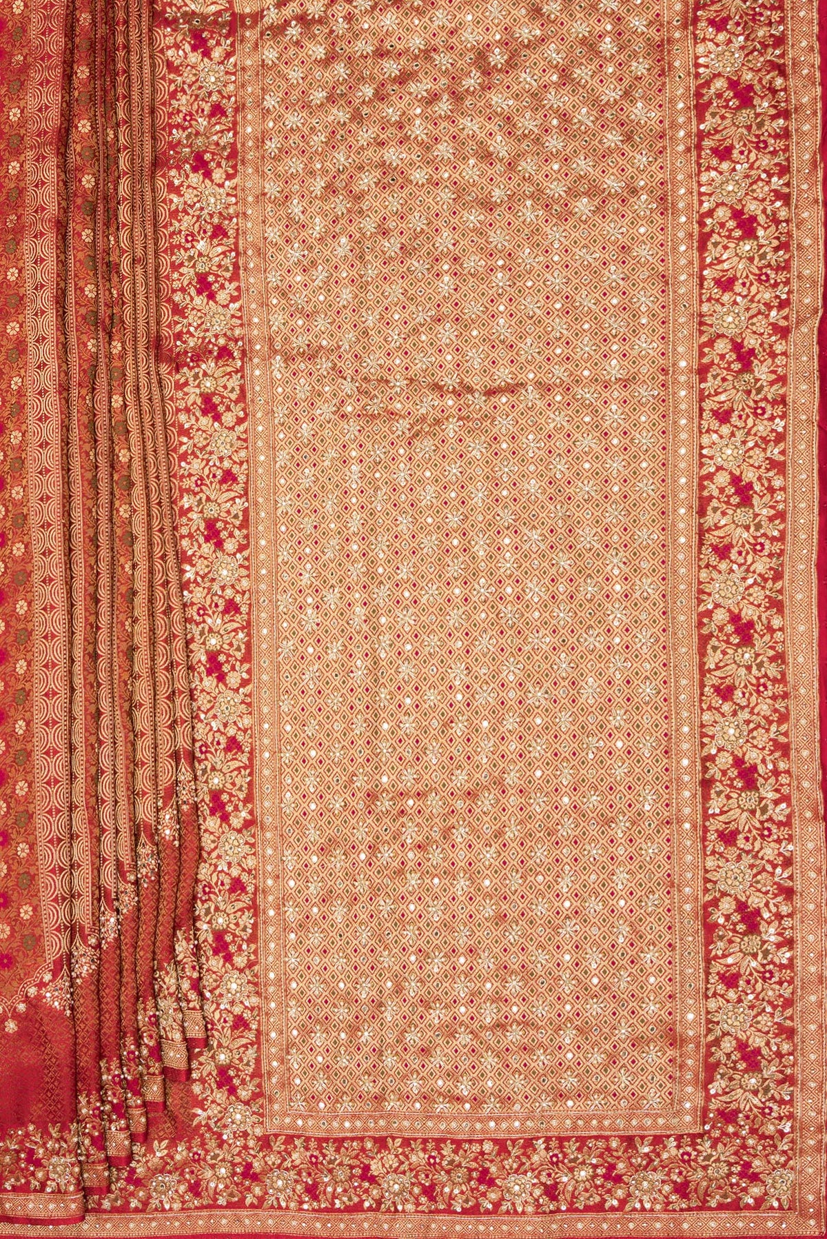 Pleats and pallu of Red Crepe Saree with Embroidered on the body and Sequin Border. 