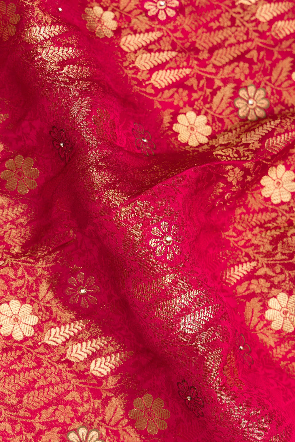 Close up of Imperial Red Crepe Saree with Embroidered on the body and Sequin Border.  displaying folds