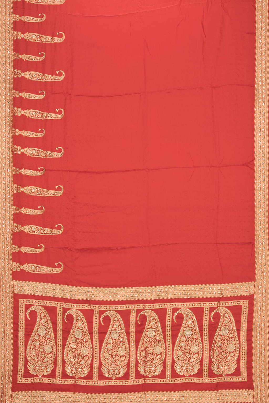 Flat view of Orange Satin Saree with Plain Body and Sequin Border. 