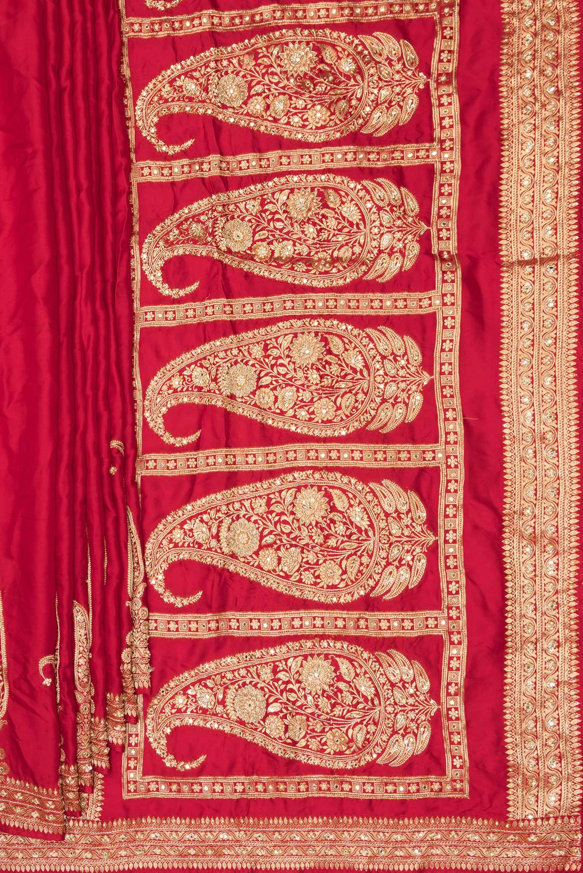 Pleats and pallu of Red Satin Saree with Embroidered on the body and Sequin Border. 