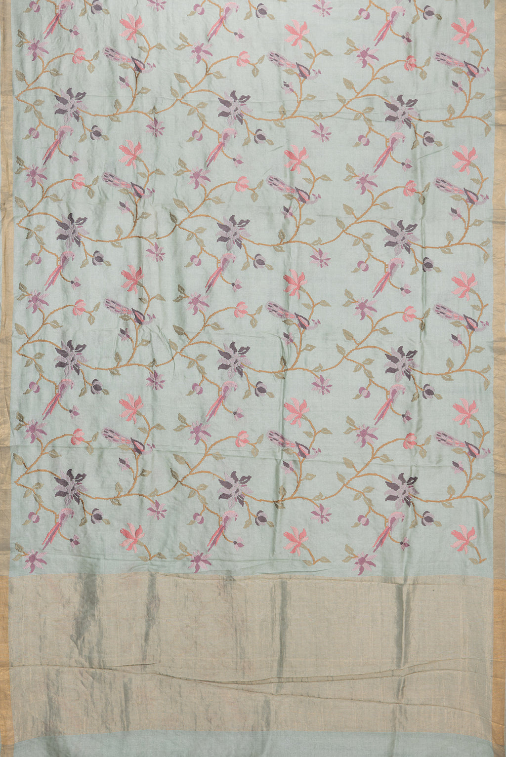 Flat view of Light Green Tussar Saree with Embroidered on the body and Zari Border. 