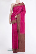 Pure Silk Dark Pink Tussar Saree with Zari Butta on the body and Zari Border.  displayed on a mannequin