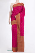 Pure Silk Dark Pink Tussar Saree with Zari Butta on the body and Zari Border.  displayed on a mannequin