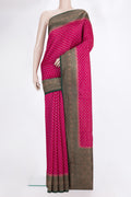 Pure Silk Dark Pink Tussar Saree with Zari Butta on the body and Zari Border.  displayed on a mannequin