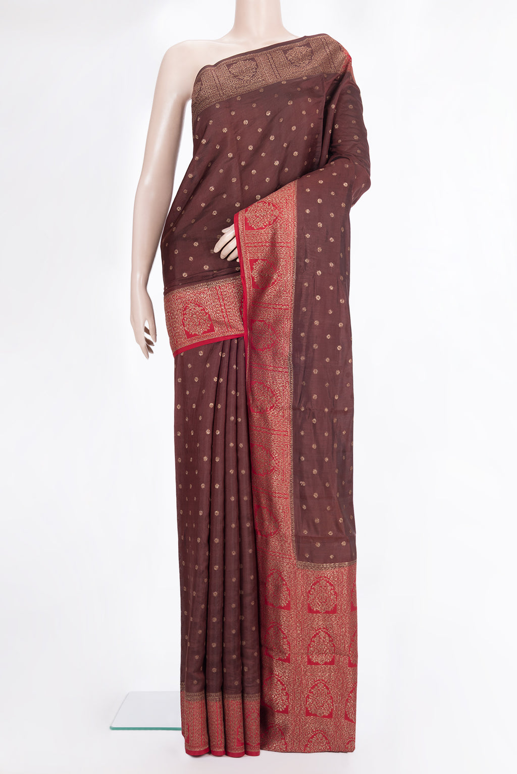 Pure Silk Brown Tussar Saree with Zari Butta on the body and Zari Border.  displayed on a mannequin