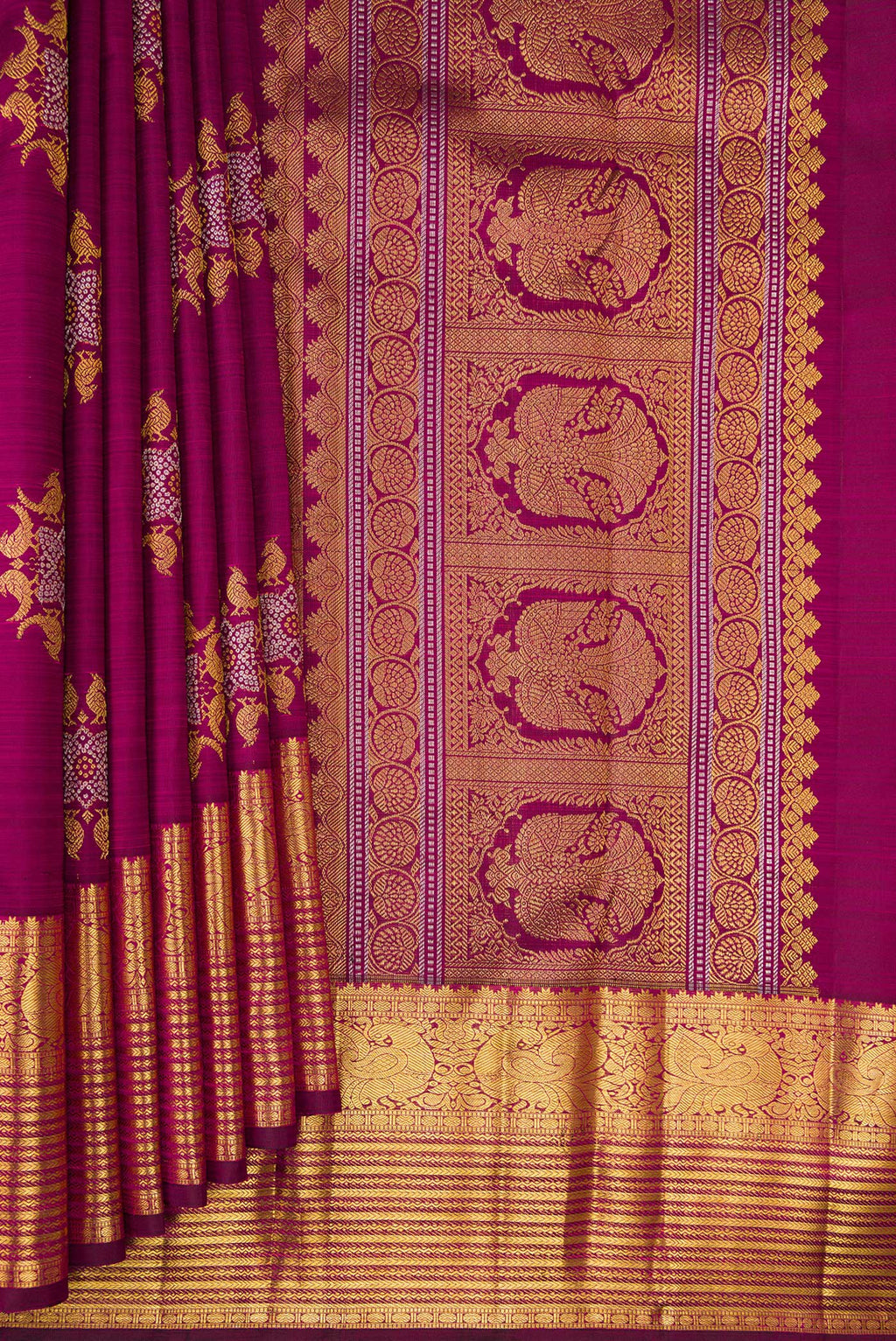 Pleats and pallu of Pure Silk Magenta Kanjivaram Saree with Zari Butta on the body and Zari Border. 