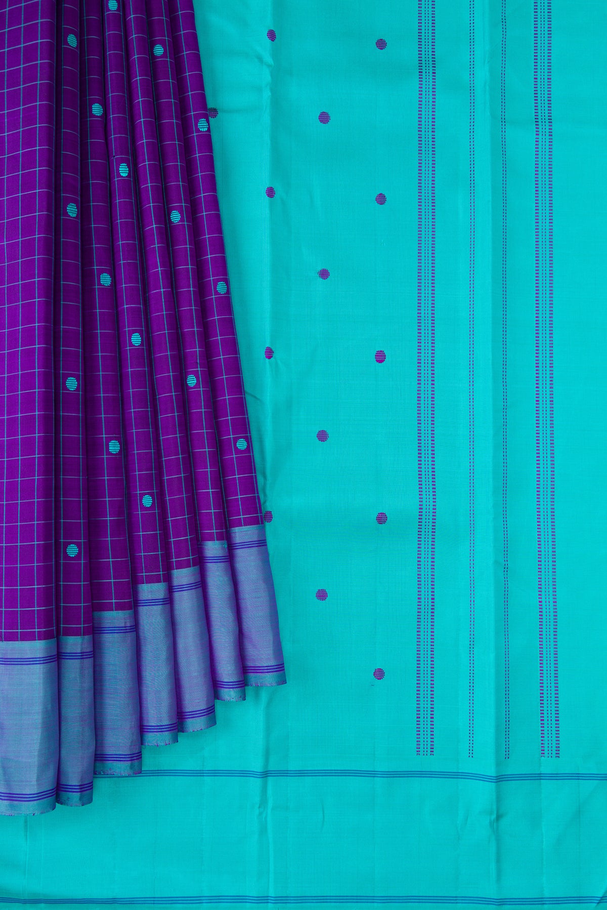Pleats and pallu of Pure Silk Violet Kanjivaram Saree with Checked design on the body and Plain Border. 