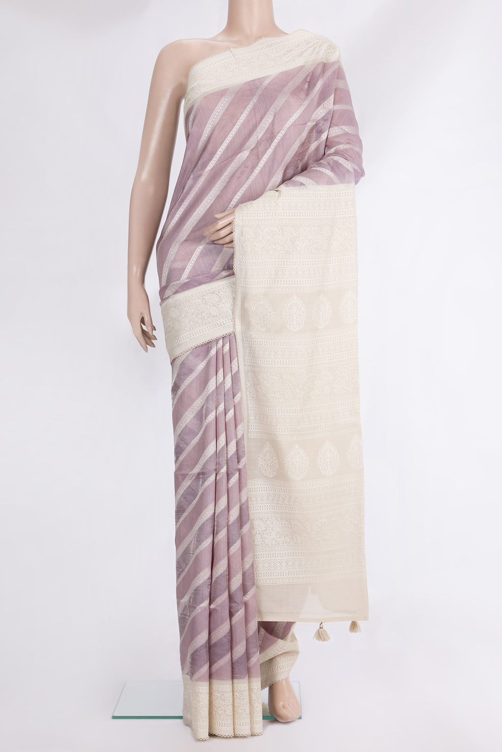 Lavender Dual Tone Tussar Saree with Zari Brocade on the body and Embroidered Border.  displayed on a mannequin