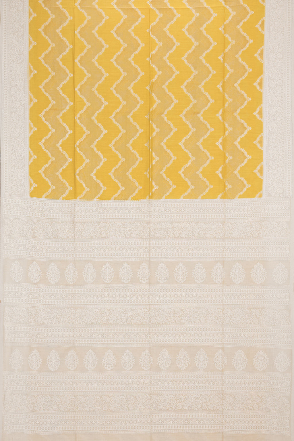 Flat view of Yellow Tussar Saree with Zari Brocade on the body and Embroidered Border. 