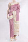 Pink Tussar Saree with Embroidered on the body and Embroidered Border.  displayed on a mannequin