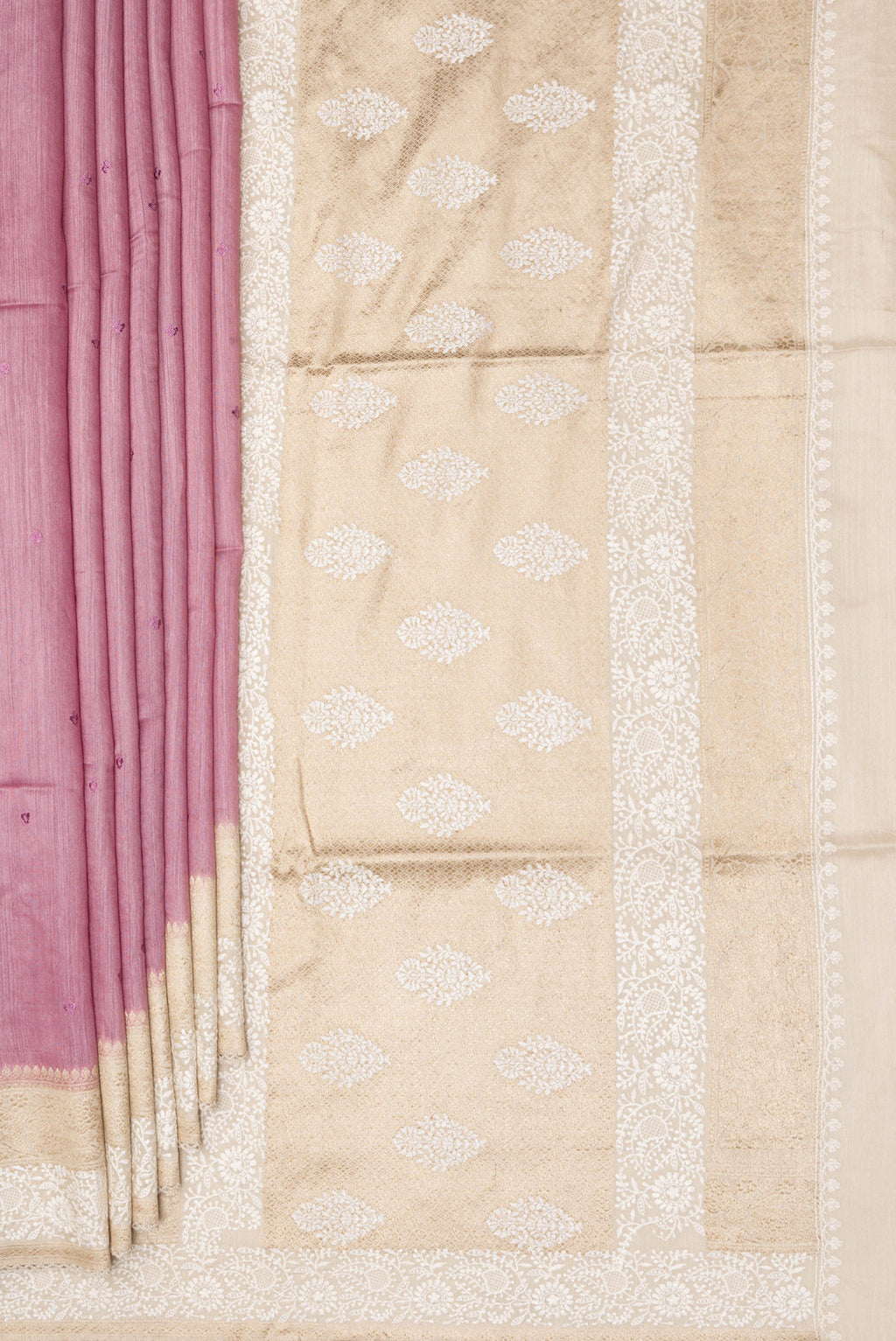 Pleats and pallu of Pink Tussar Saree with Embroidered on the body and Embroidered Border. 
