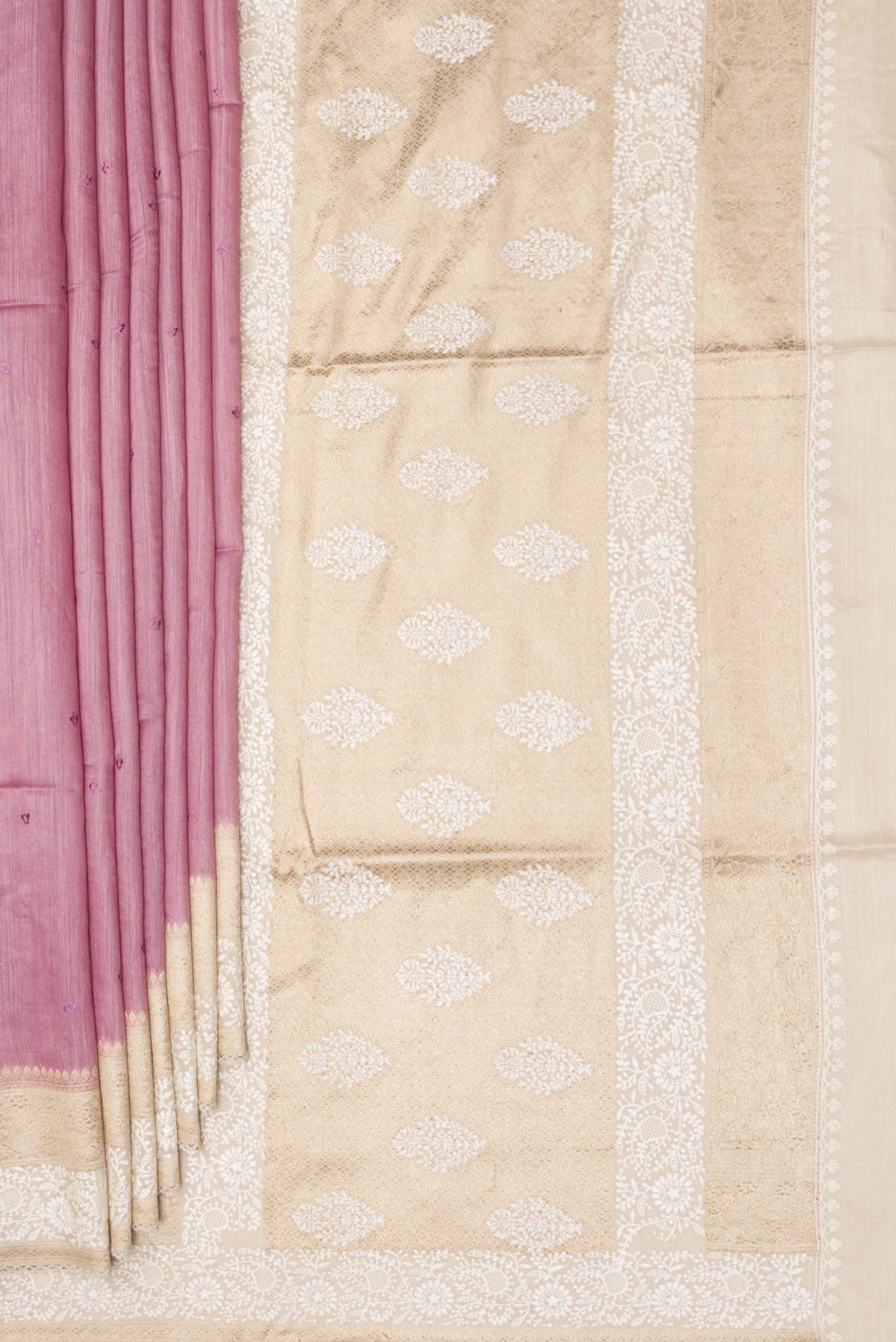 Pleats and pallu of Pink Tussar Saree with Embroidered on the body and Embroidered Border. 