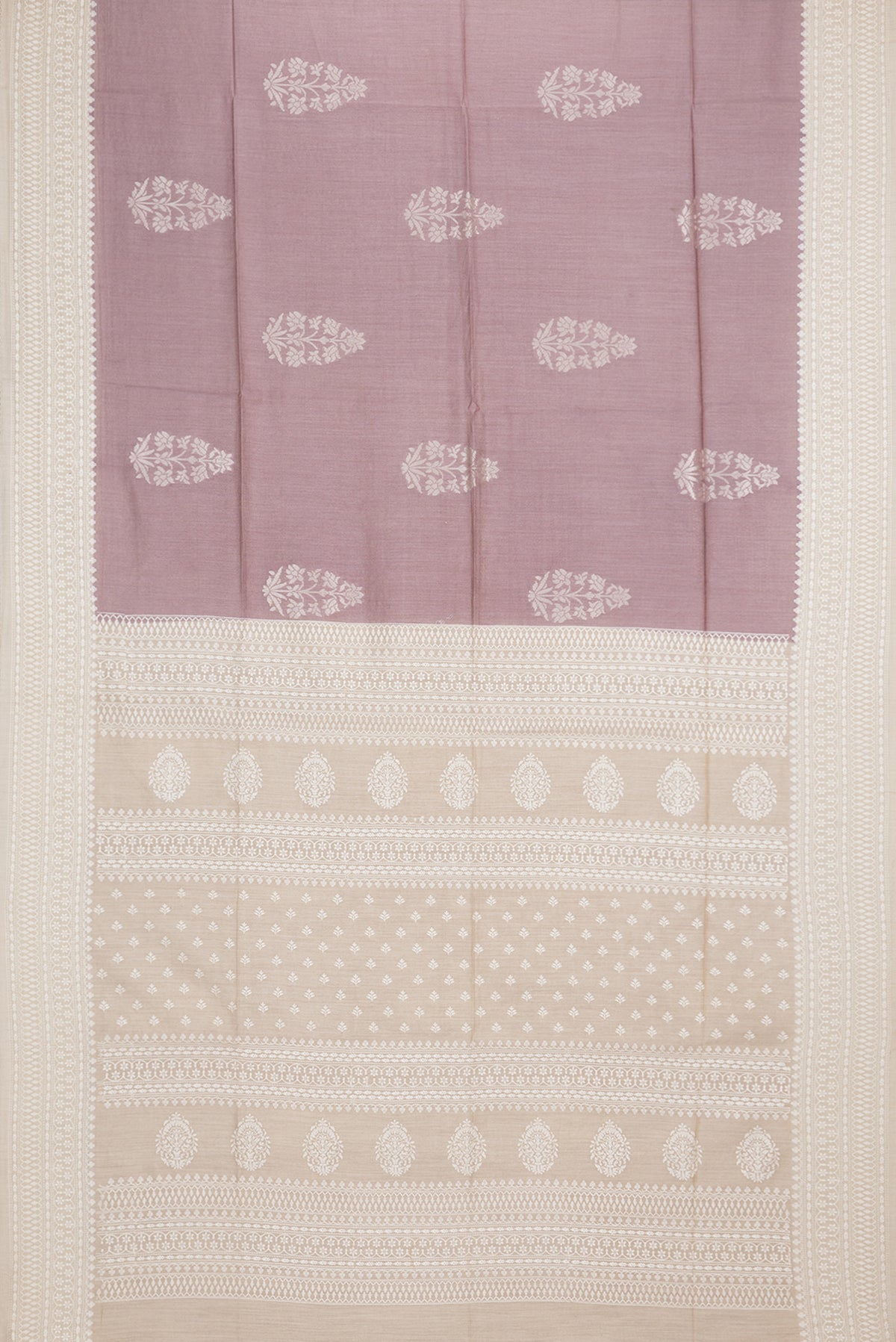 Flat view of Pure Silk Rose Gold Dual Tone Tussar Saree with Zari Butta on the body and Embroidered Border. 