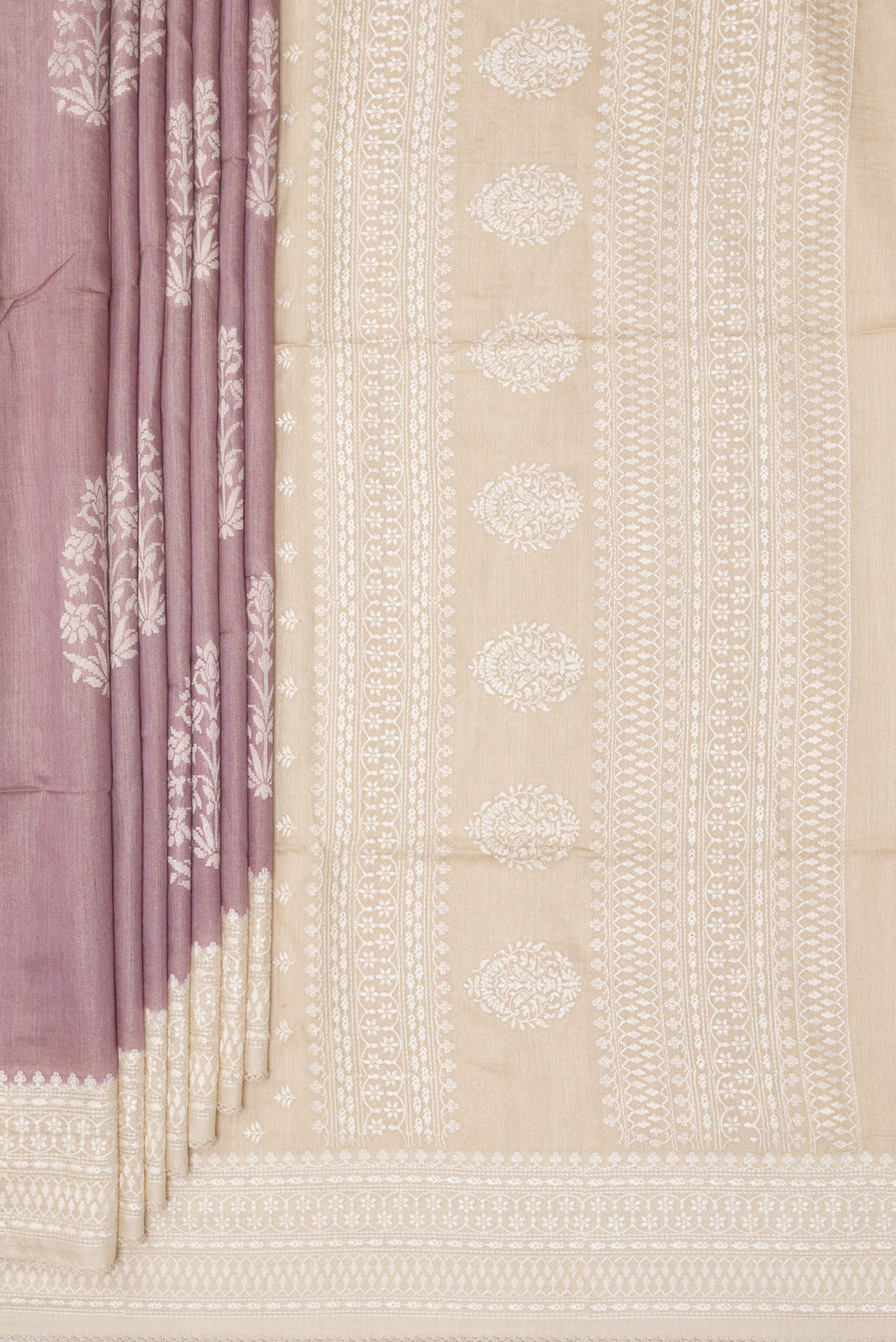 Pleats and pallu of Pure Silk Rose Gold Dual Tone Tussar Saree with Zari Butta on the body and Embroidered Border. 