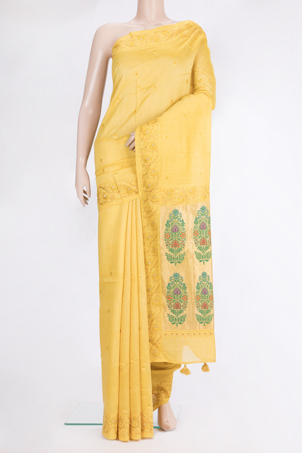 Yellow Tussar Saree with Embroidered on the body and Embroidered Border.  displayed on a mannequin