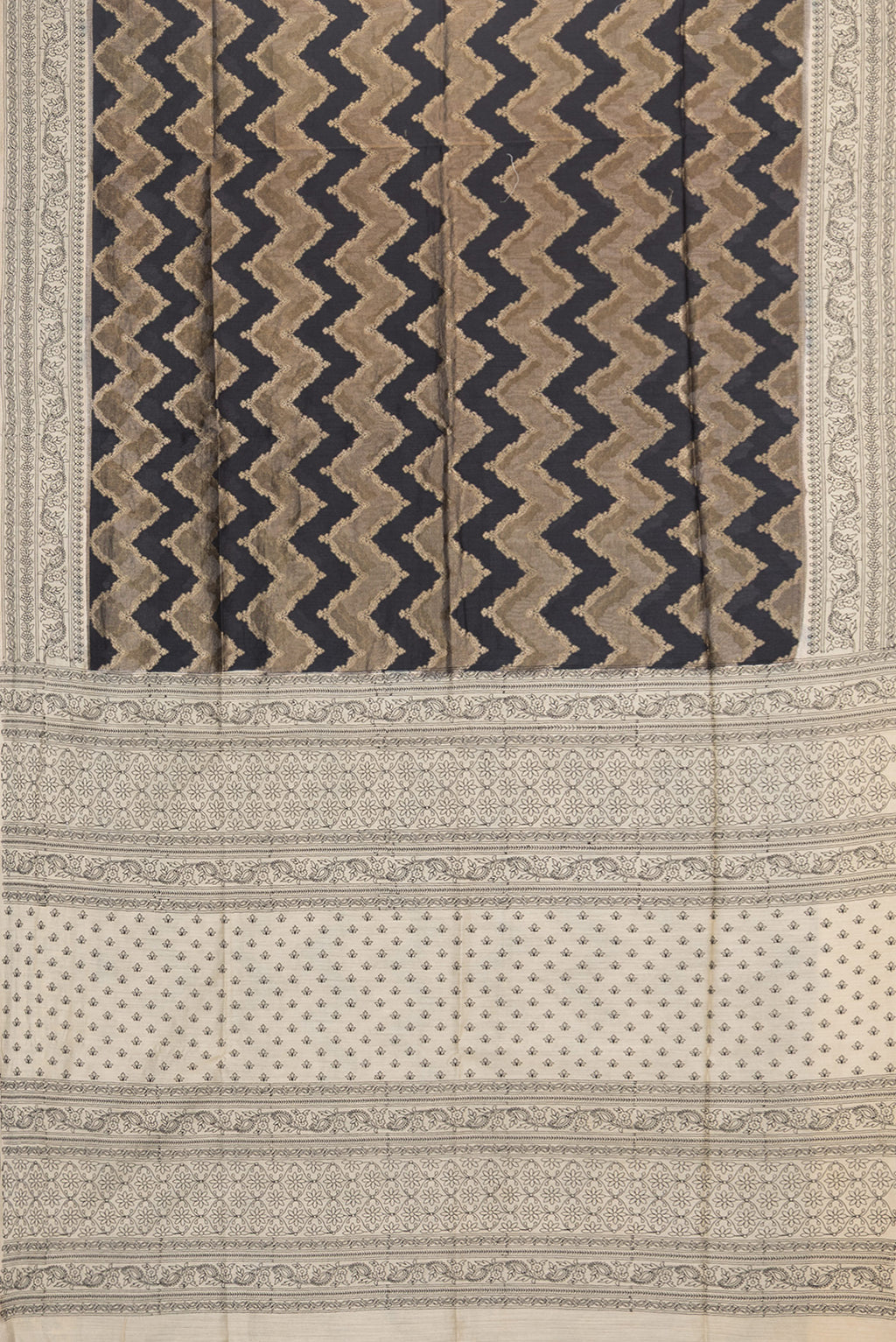 Flat view of Black Tussar Saree with Zari Brocade on the body and Embroidered Border. 