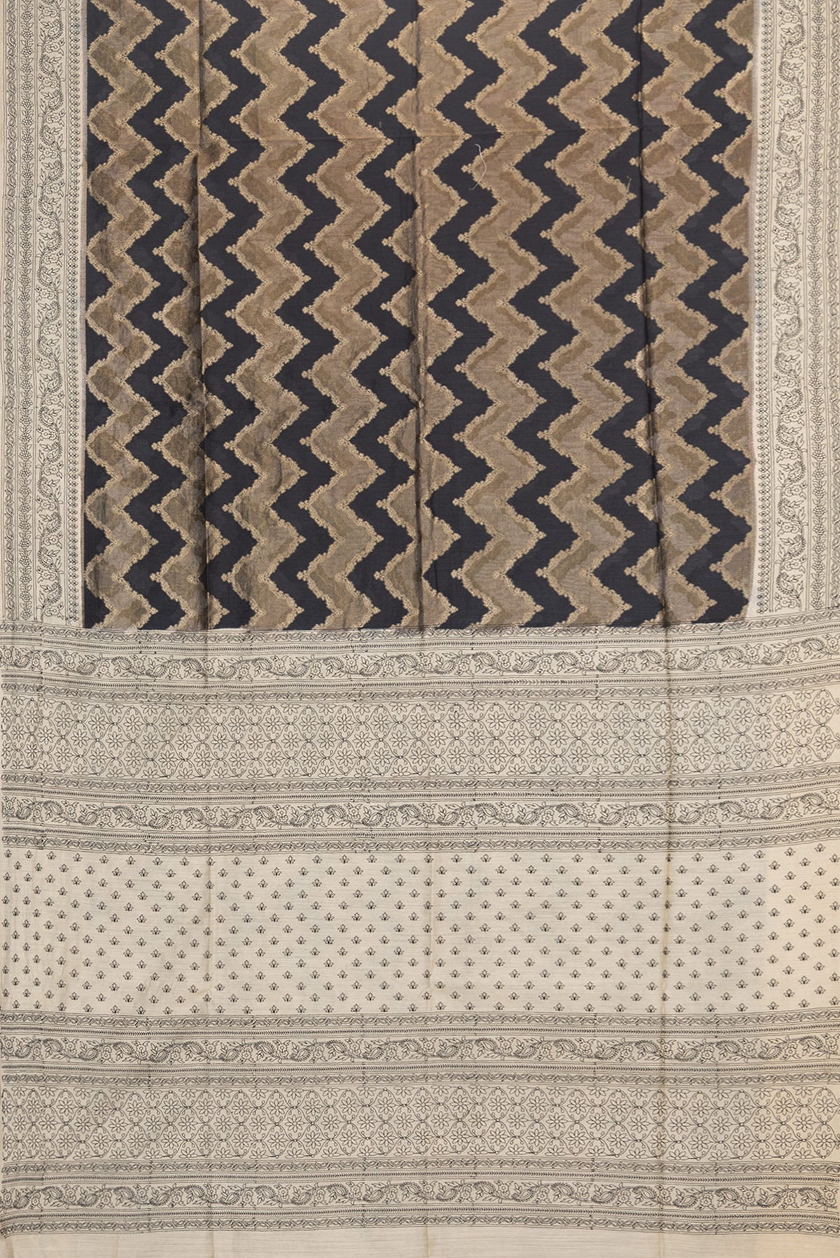 Flat view of Black Tussar Saree with Zari Brocade on the body and Embroidered Border. 