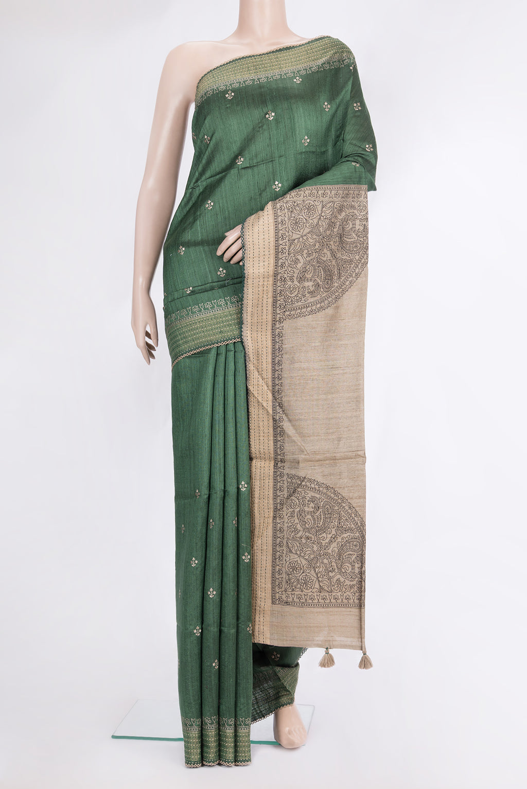 Pure Silk Green Tussar Saree with Embroidered on the body and Embroidered Border.  displayed on a mannequin