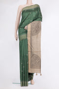 Pure Silk Green Tussar Saree with Embroidered on the body and Embroidered Border.  displayed on a mannequin